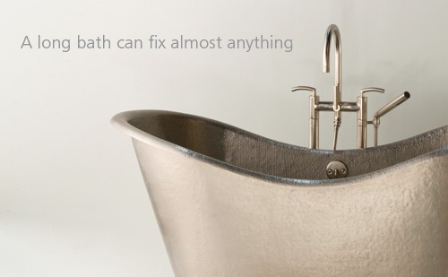 Aurora copper soaking tub in brushed nickel. Aurora copper soaking tub in brushed nickel.