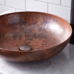 Tempered sink with Weathered Copper drain finish