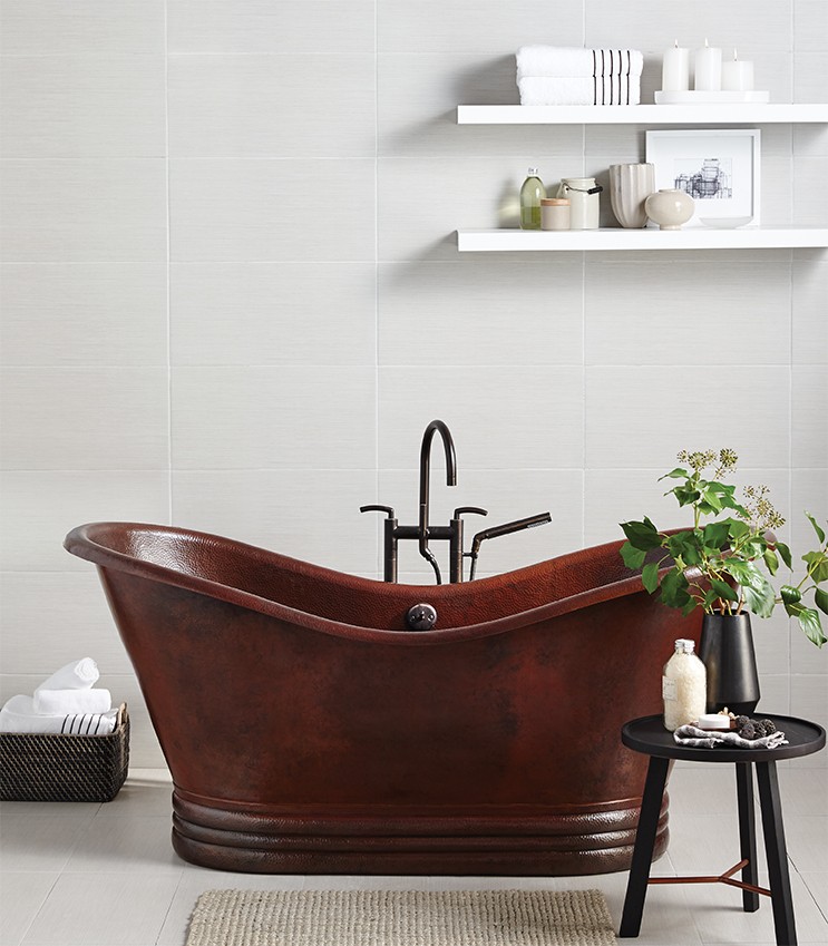 copper bathtub with tub filler