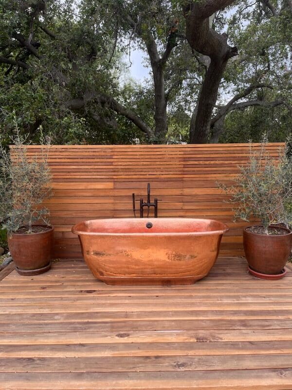 Copper bathtub takes center stage in Justin Baldoni's Ojai backyard making his wife's lifelong dream a reality