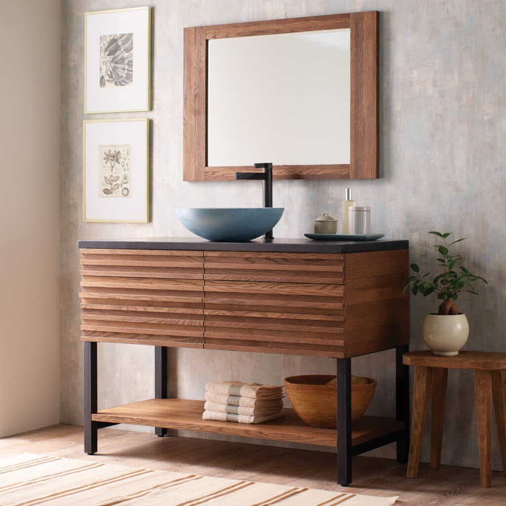 Warm wood bathroom design vanity featuring horizontal slats and generous wood graining.