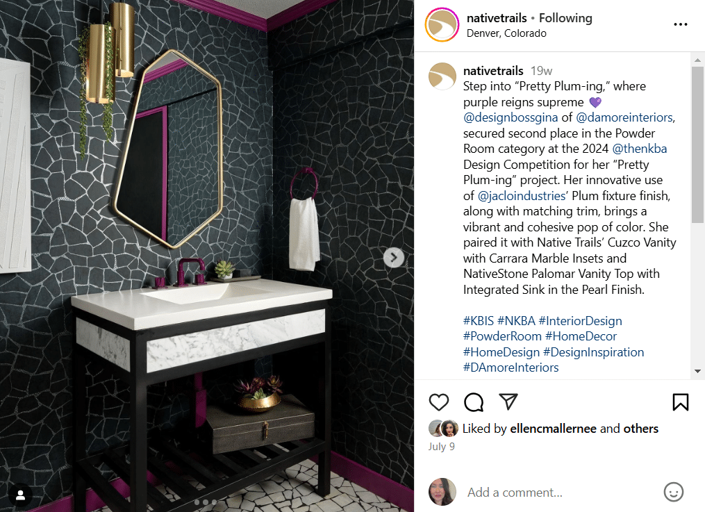 top 10 Native Trails designs: A marble vanity with a concrete countertop set against a dramatic black and silver geometric wallpaper.