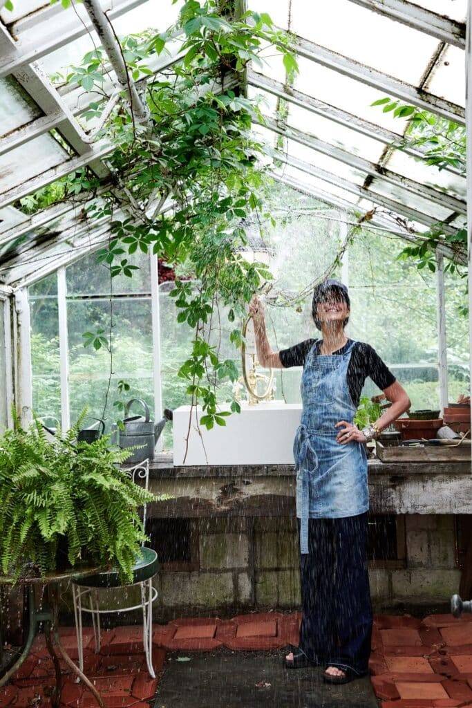 Design inspiration from Leanne Ford; a Native Trails NativeStone concrete sink in Pearl is in her personal greenhouse.