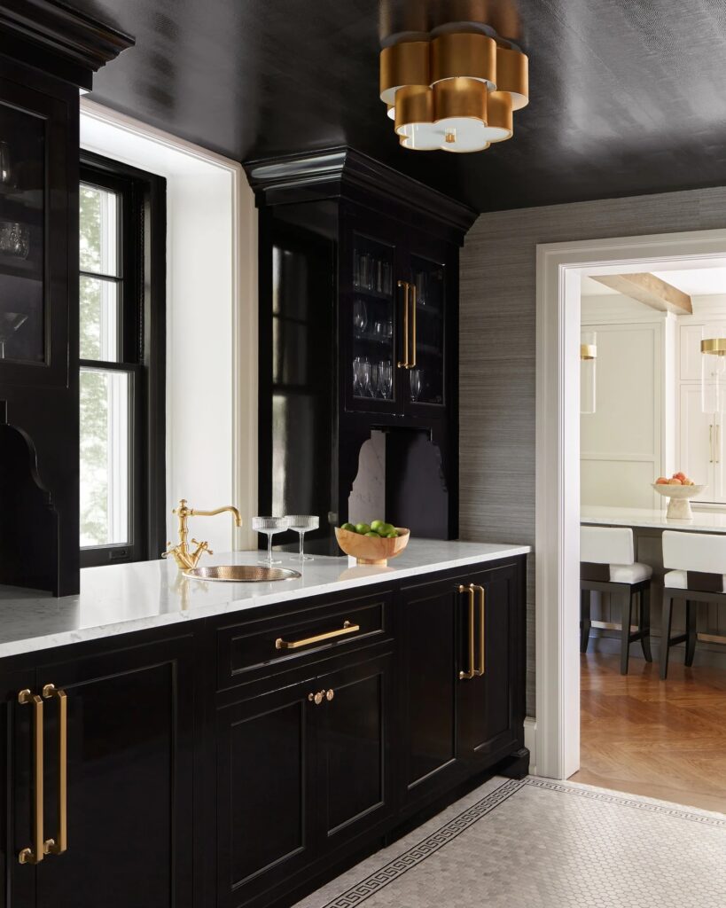 Brushed nickel bar sink in a luxury wet bars by Gardner/Fox and Ainsley Brookins Design